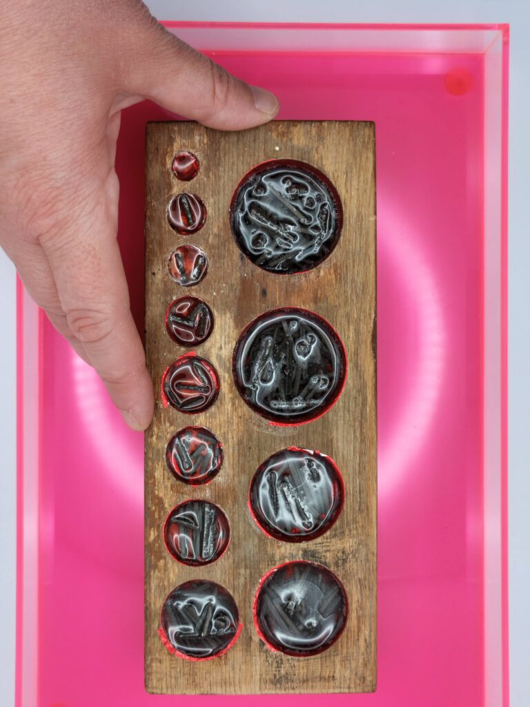 The fucks I give — shown in hand for scale